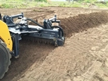 New Power Rake moving in a field,Up close of new Virnig Power Rake in field